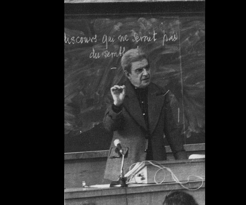 Lacan lecturing with blackboard